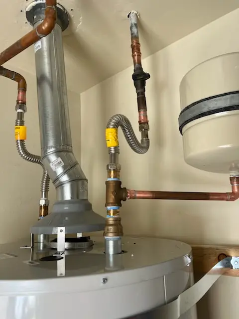 Water heater installation and plumbing repair in Pondville